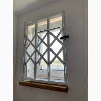 Раздвижные решетки металлические на двери окна балконы витрины. Производство и установкa